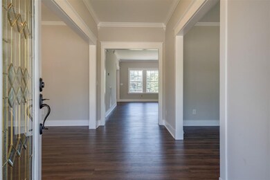 Sprawling, bright entry foyer opening to popular f
