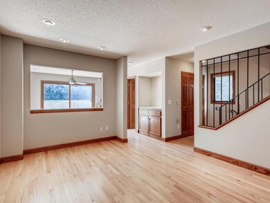 Up one level from the Entry, the Living Room is sp