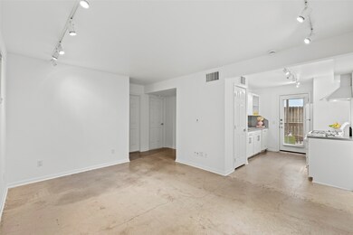 Open concept living area with polished concrete fl