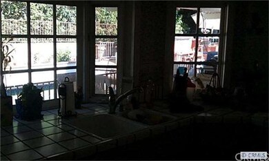 Kitchen Garden Window Look Out To Family Pool
