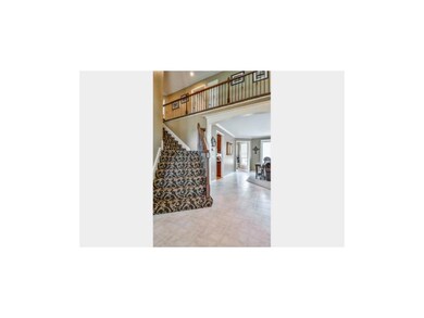 Enter into the grand 2-story foyer with ceramic ti