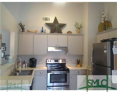 Kitchen. Updated cabinetry with brushed nickel acc