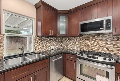 Stainless Steel sink overlooks beautiful back yard