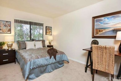 One of two bedrooms that back to the gorgeous wood