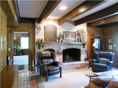 Cozy and Inviting Family Room...enjoy company by the fire.