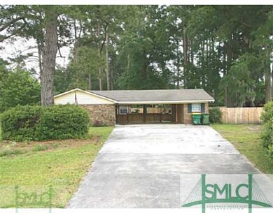 Exterior Front. Large Driveway showing attached st