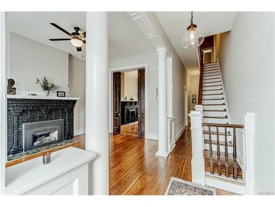 Foyer/Staircase and Front Parlor.  Note original p