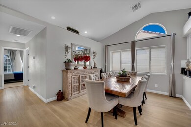 Dining space with light wood finished floors, plen