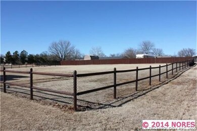 Fully fenced backyard with privacy fence on back.