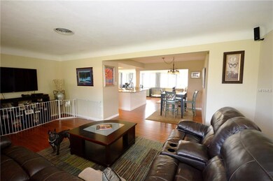 Family room , dining area with view of sunroom.