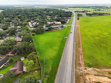 1.6 acre lot off West Loop (FM 2765)