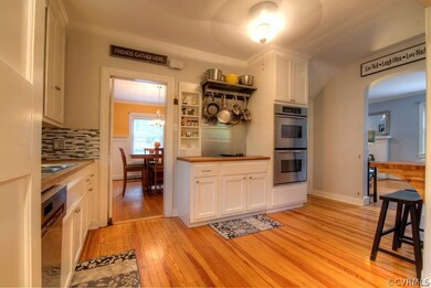 Beautifully renovated kitchen with floor to ceilin
