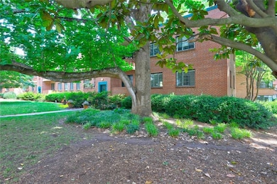 View of front of property featuring brick siding