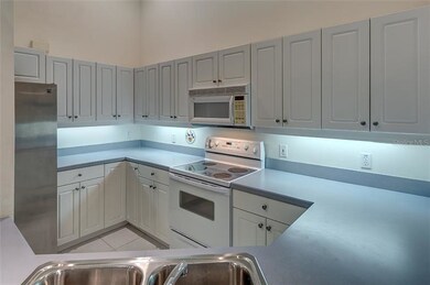 Plenty of light and cabinet space in the kitchen.