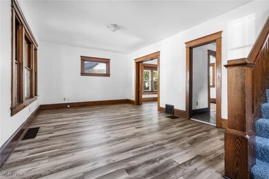 Living room with LVT and original woodwork