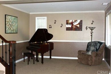 Formal living room directly off front entryway is 