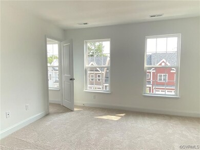 Unfurnished room with light carpet