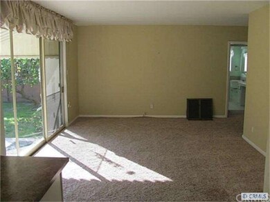 Large living room with big picture window overlook