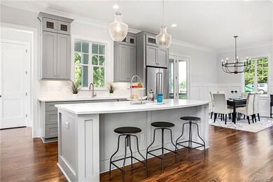Kitchen open to living room and dining room
