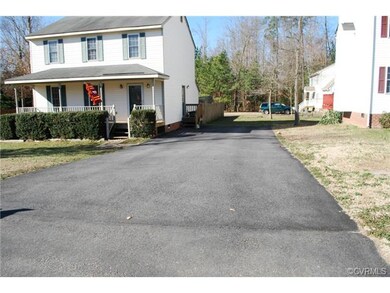 Large paved driveway.