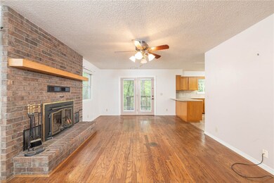 Original Hardwood Floors and Hearth/Fireplace