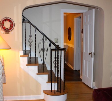 Great arches and wrought iron banister!