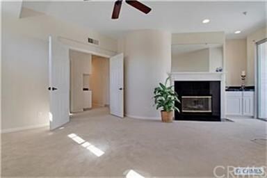 Master bedroom complete with wet bar, fireplace an