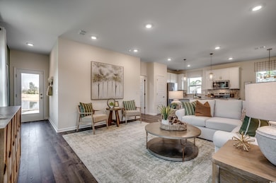 Living room featuring dark hardwood / wood-style f