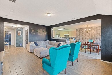Living area featuring light wood-type flooring, a 