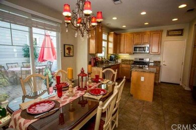 Kitchen and space open to family room