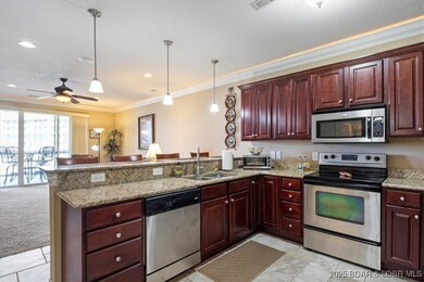 Custom cabinetry with Crown Molding, SS Appliances