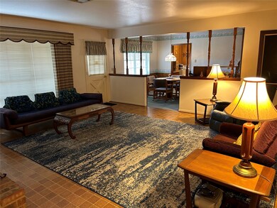 Living Room Looks Onto Casual Dining Area