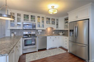 Well appointed kitchen features custom buildt 3/4 inch birch cabinets, 