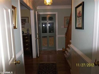 Foyer - Wood floor/Glass panel storm door