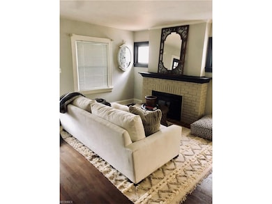 Inviting Living Room with a Cozy Fireplace!