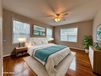 Bedroom 1. Hardwood floors, tons of natural light.