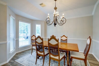 The beautiful dining room with bay windows and an elegant chandelier is the perfect space to host lavish dinner parties and casual gatherings. Your friends and family are going to love breaking bread with you in this beautiful space.