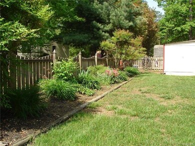 Rear yard is completely fenced in and landscaped b