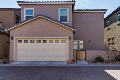 Back of Home w/ Garage