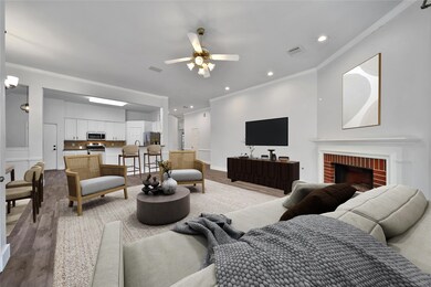 The kitchen is open to the family room with a breakfast bar for additional seating and serving space.