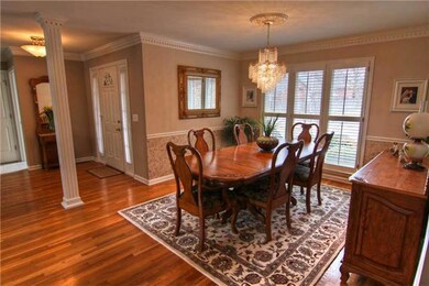 Great size formal dining room with hardwood floors. 