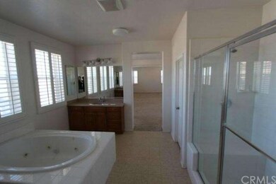 Master bathroom with jetted tub, double vanities, 
