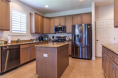 12843 Carrington Cir unit 9-102, Naples, FL 34105 - photo 6