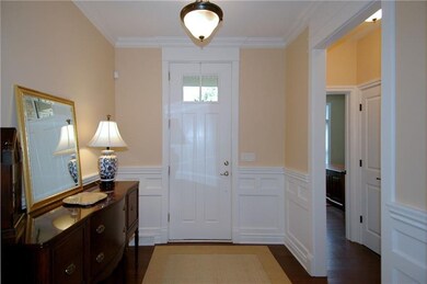 Entry - 9-foot ceilings, crown molding, chair rail