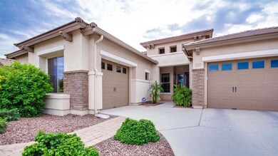 Front Entrance and Two Garages