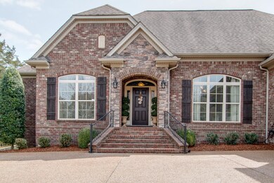 Stroll up the front steps to the entry foyer.