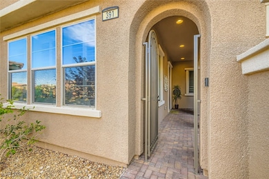 Property entrance with stucco siding
