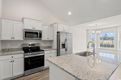 Kitchen featuring appliances with stainless steel 