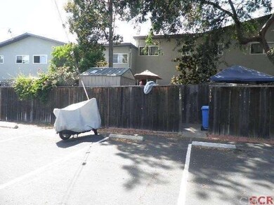 2 assigned parking spaces with gate entry to backy