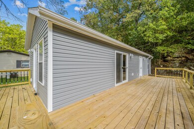 Reeds Spring Like New Home